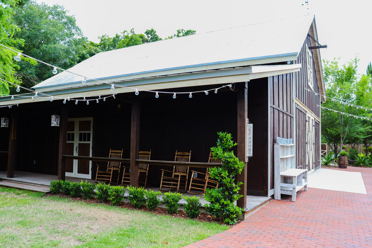 The Carriage House has a stunning farmhouse porch and yard for you to enjoy.